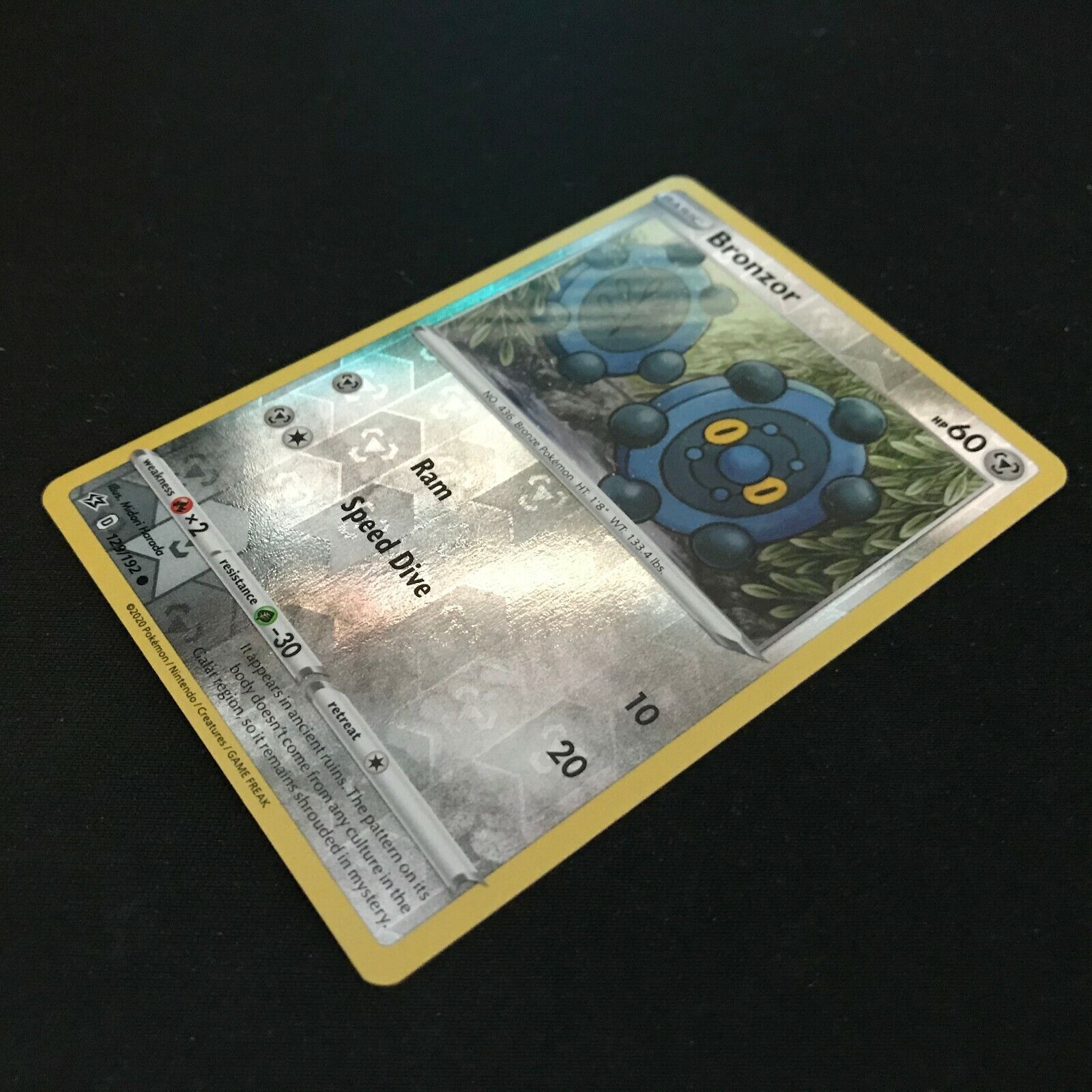Bronzor Reverse Holo 129/192 - Sword & Shield Rebel Clash Pokemon Card NM/Mint