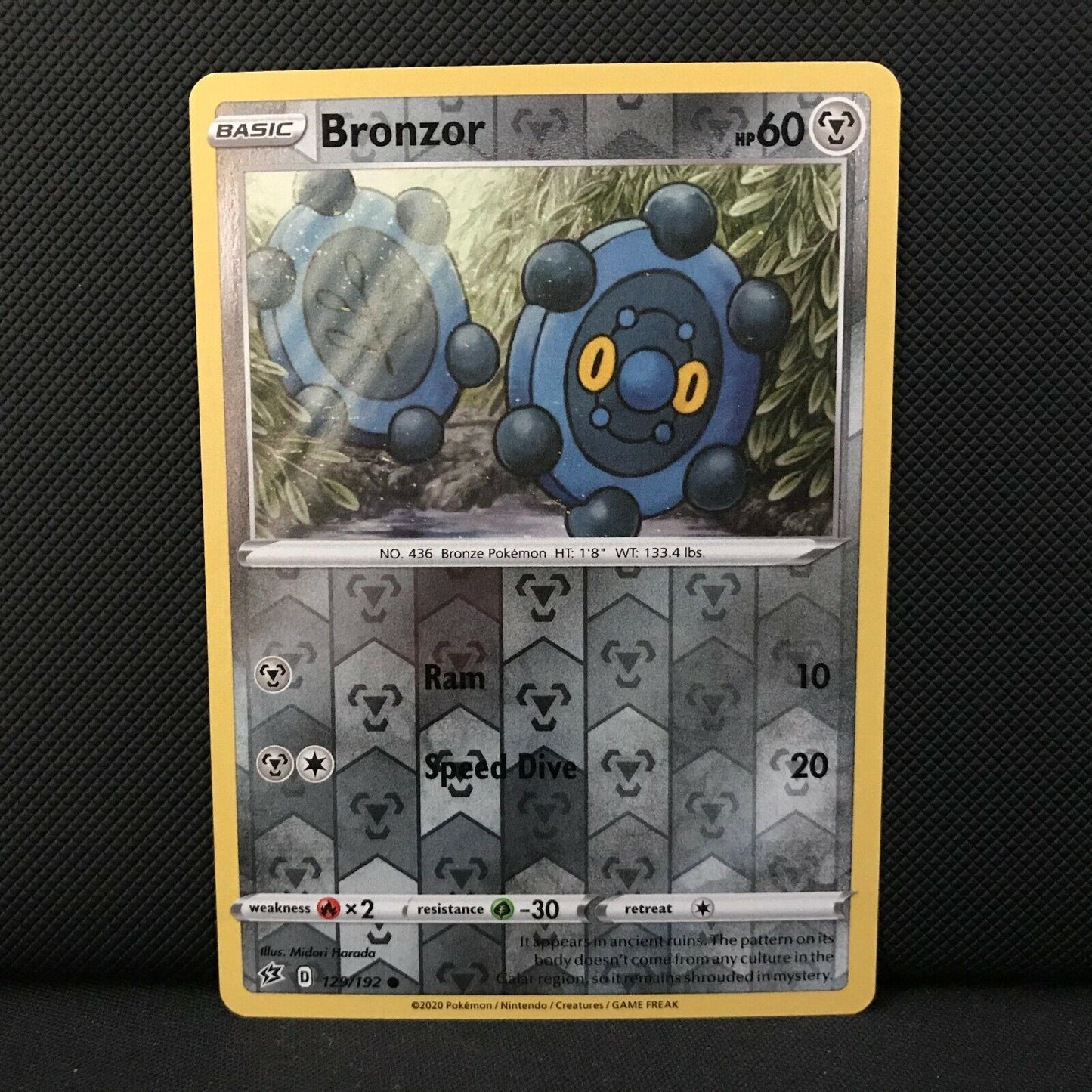 Bronzor Reverse Holo 129/192 - Sword & Shield Rebel Clash Pokemon Card NM/Mint