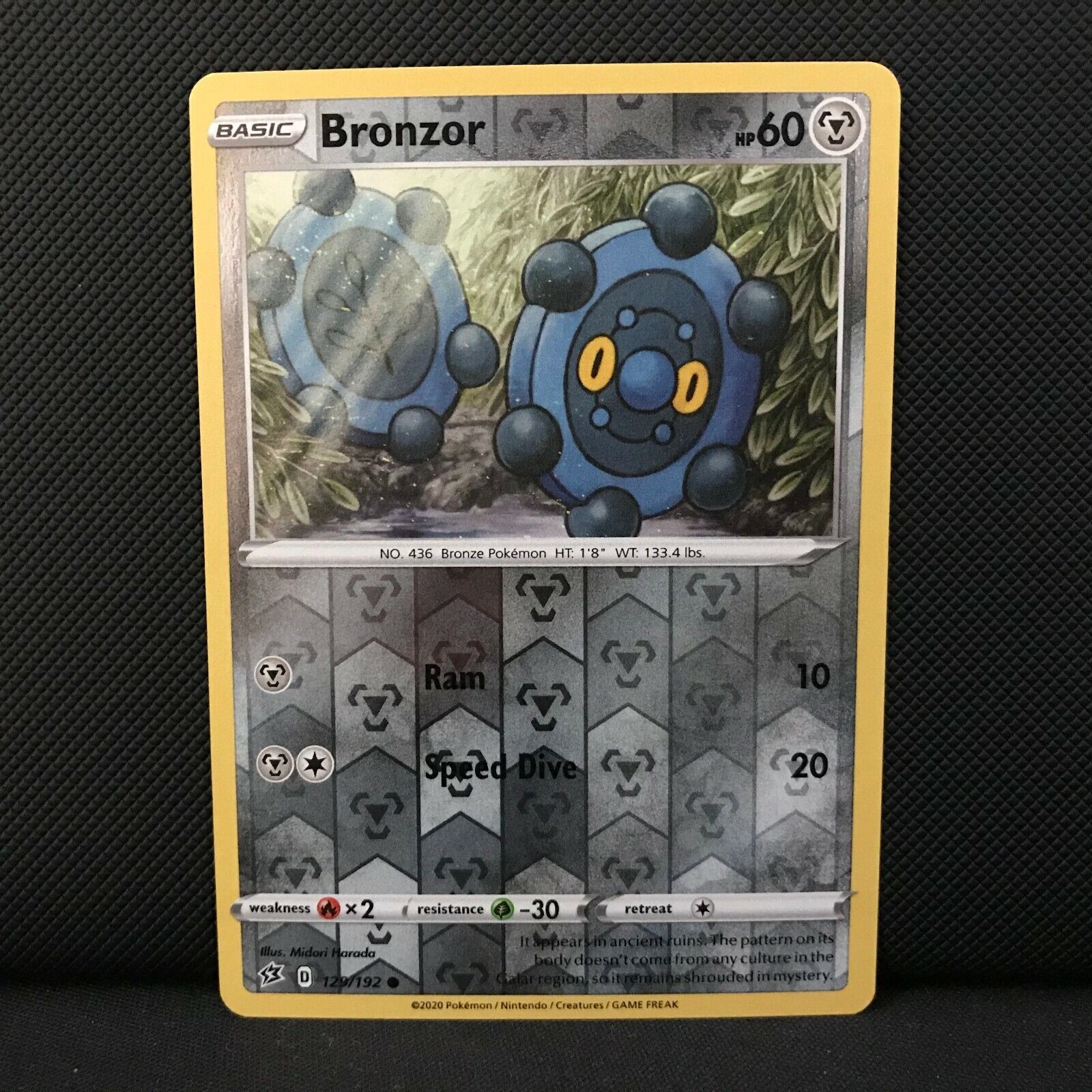 Bronzor Reverse Holo 129/192 - Sword & Shield Rebel Clash Pokemon Card NM/Mint