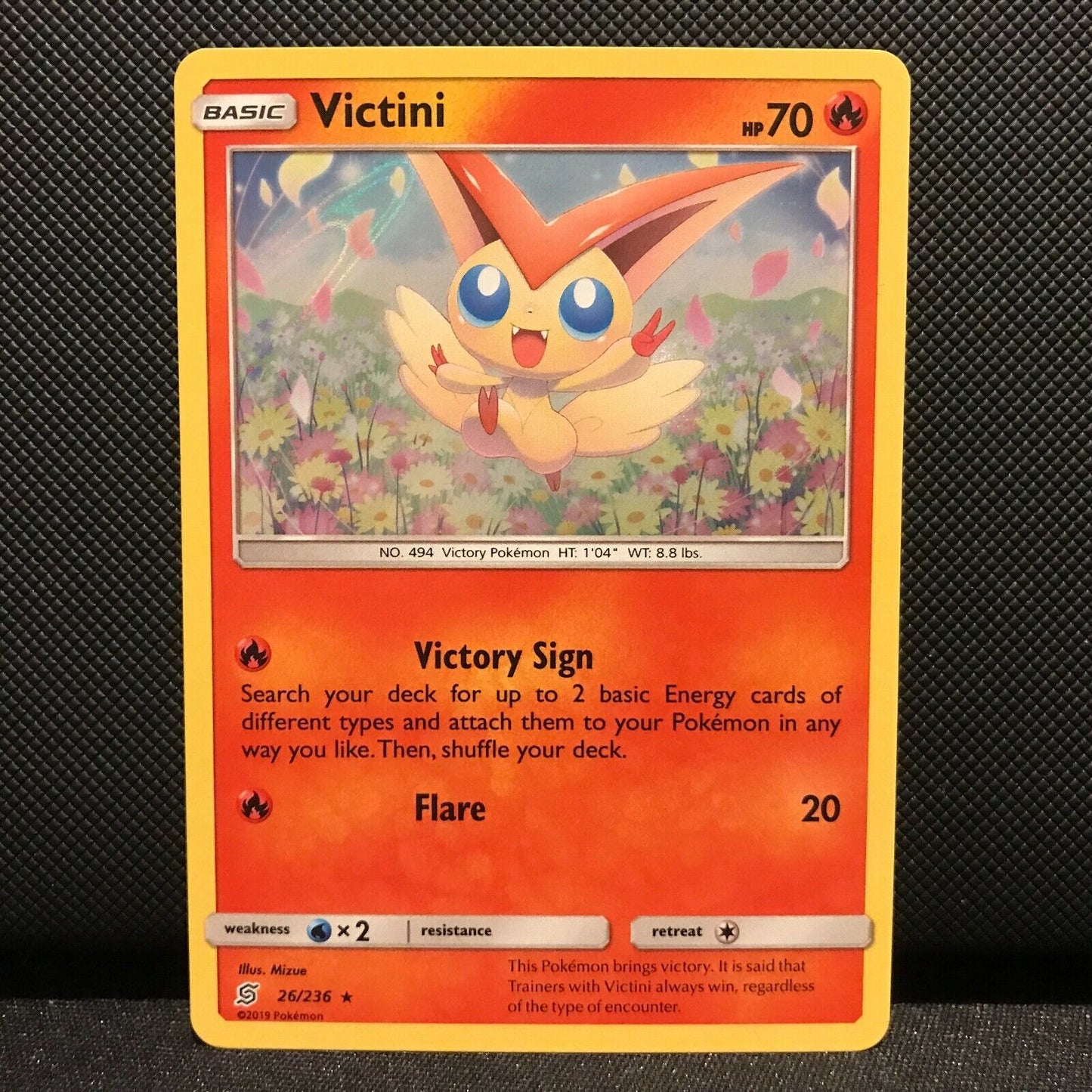 Victini Holo 26/236 - Unified Minds Pokemon Card - NM/Mint
